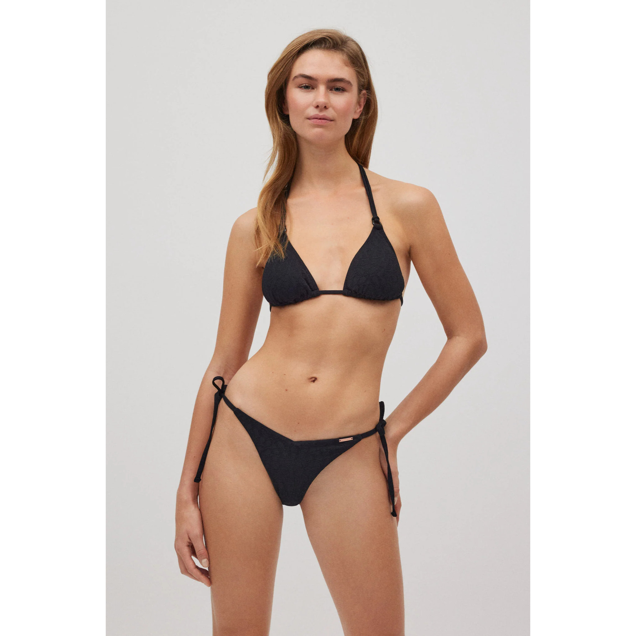 Set bikini a triangolo con trama bianca