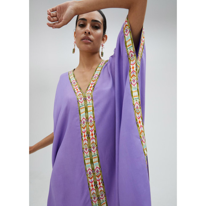 Tunica corta dettaglio