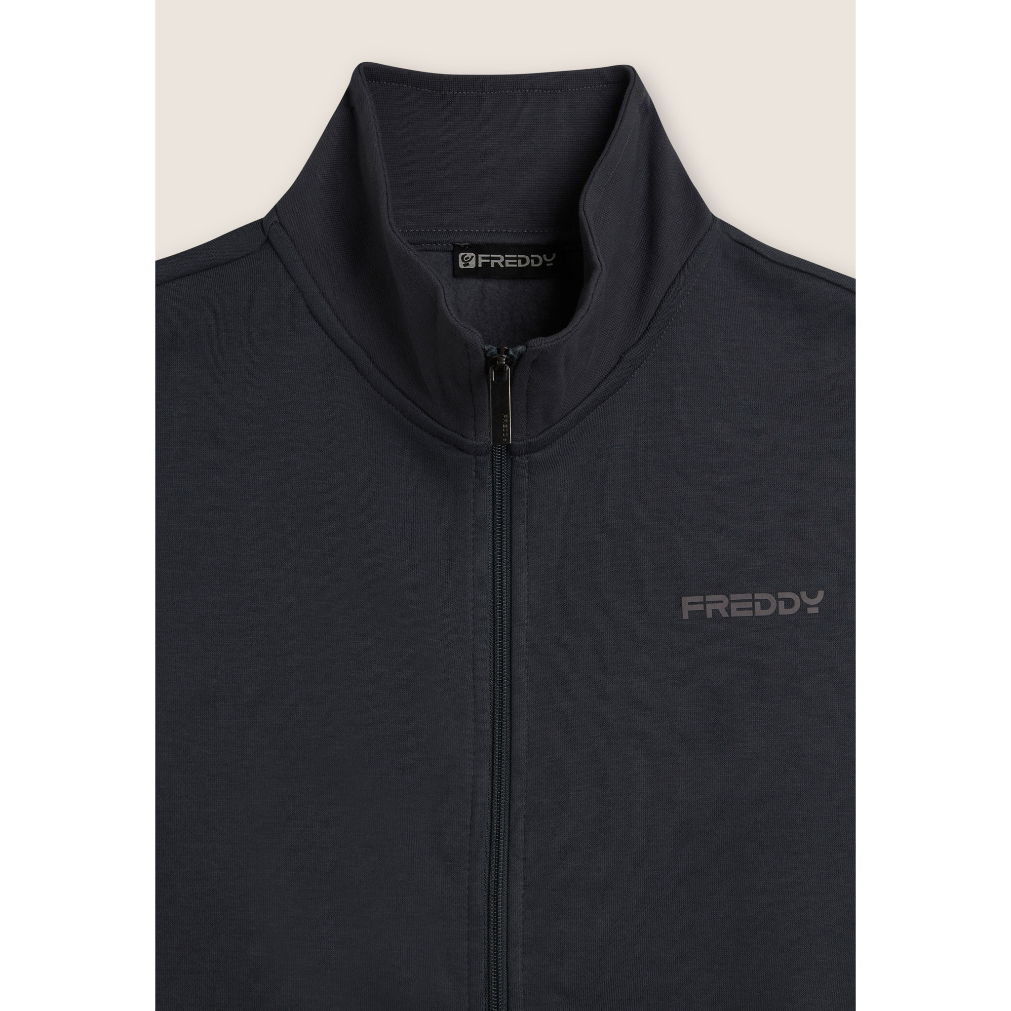 Tuta full zip in felpa garzata con collo alto e gamba dritta