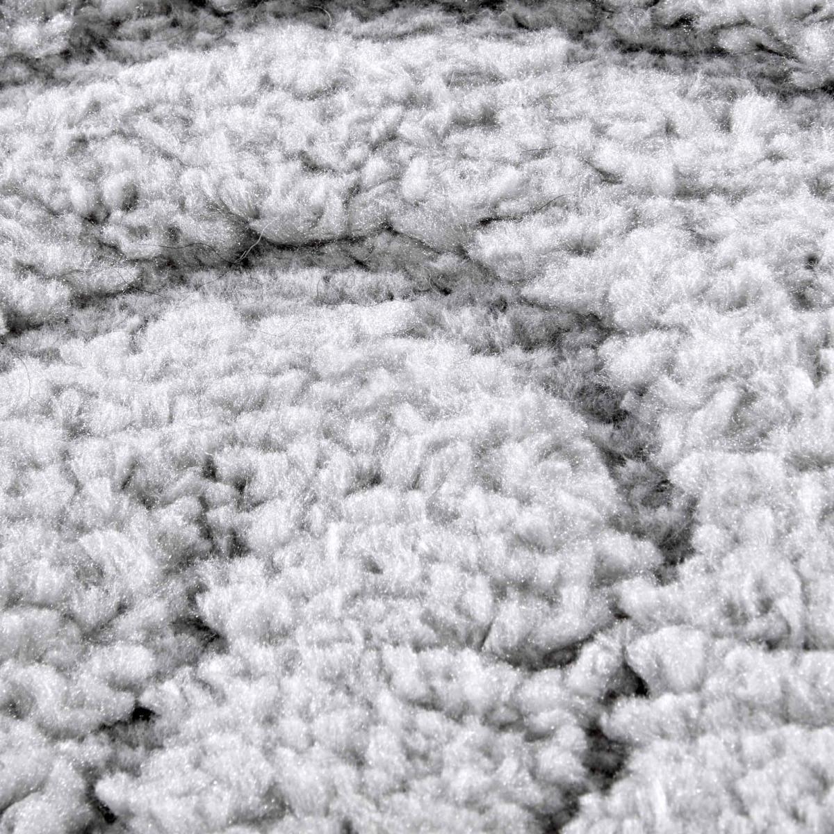 Tapis salon, motif géométrique, texture relief, lym chaleureux