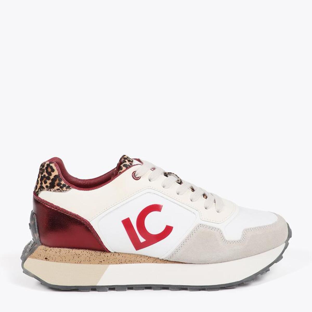 Scarpa da ginnastica con suola personalizzata e stampa animalier e dettagli in pelle