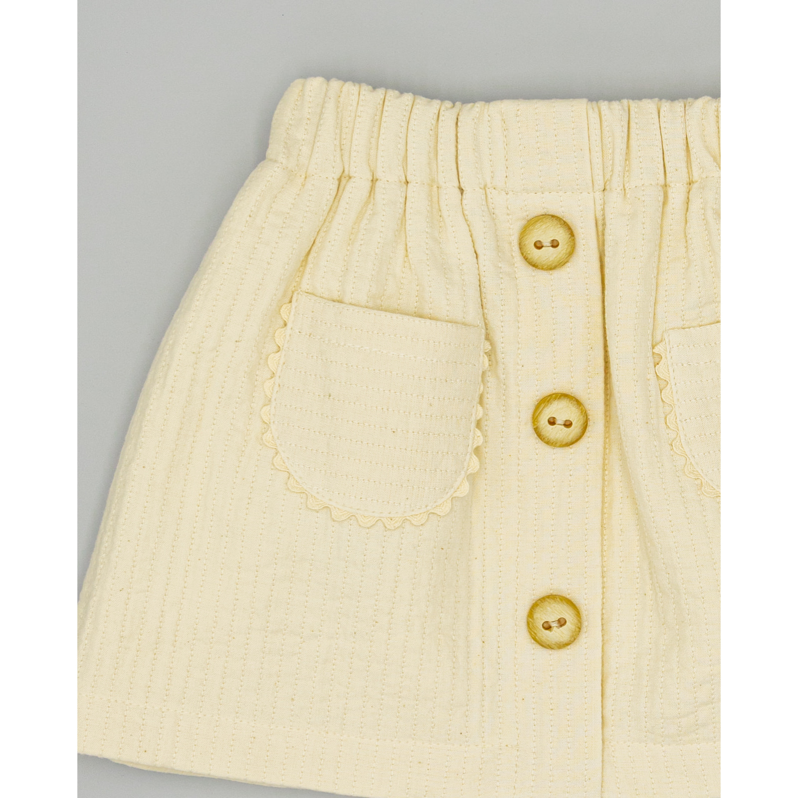Falda Beige De Tejido Texturizado Con Bolsillos