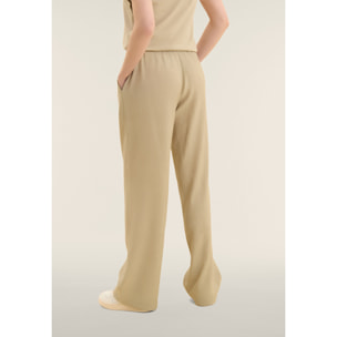 Pantaloni wide leg in tessuto crinkle fluido