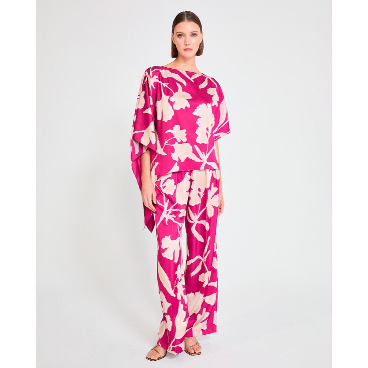 Pantaloni a gamba larga con grandi fiori di bouganville