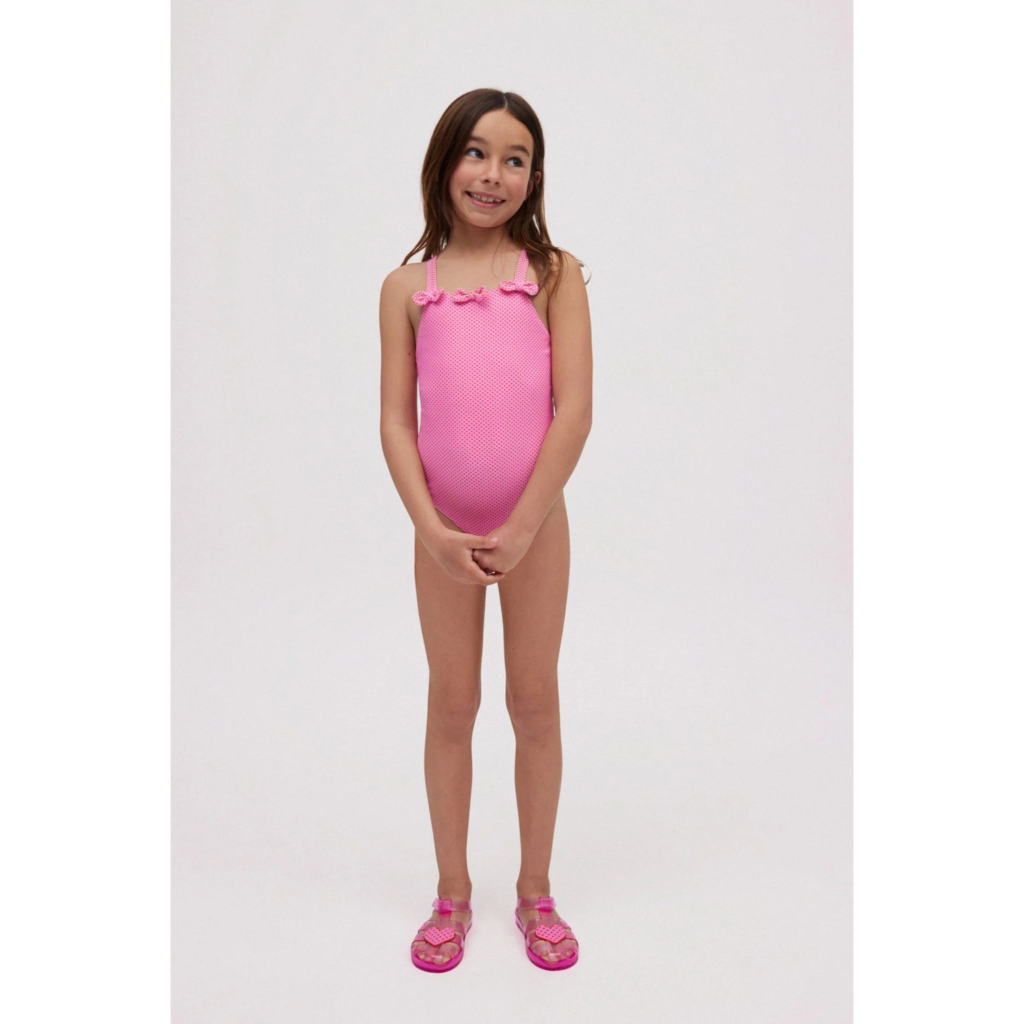 Costume da bagno rosa a pois da bambina