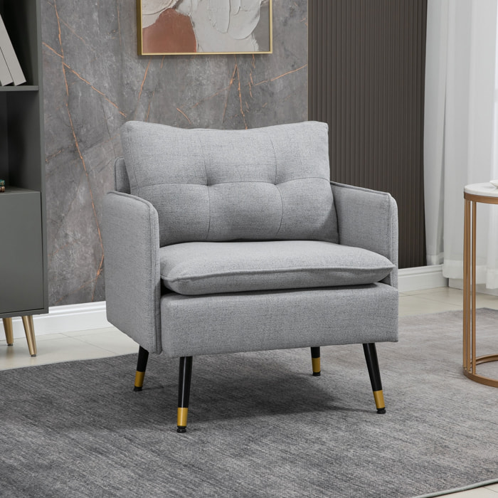 Fauteuil style art-déco dossier effet capitonné piètement incliné effilé métal noir extrémités dorées tissu gris