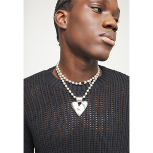 Colgante PÁLPITO PLATEADO U