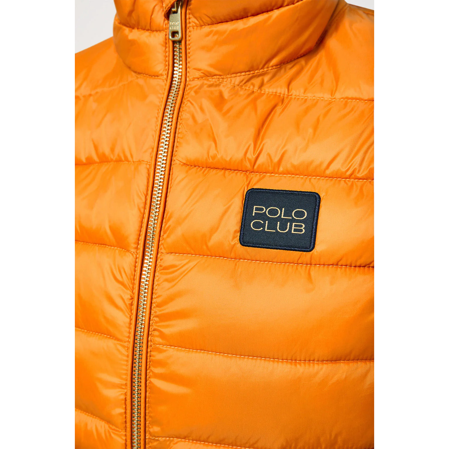 Chaleco naranja Pavel reciclado y ultraligero con etiqueta textil Polo Club