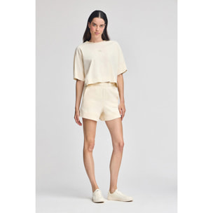 Pantalón corto de algodón color crudo con logo bordado