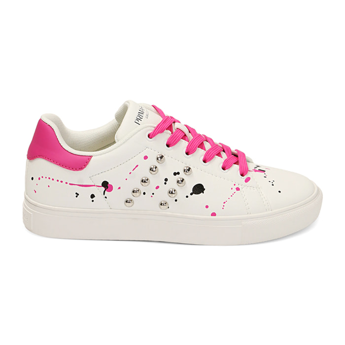 Sneakers bianche con borchie