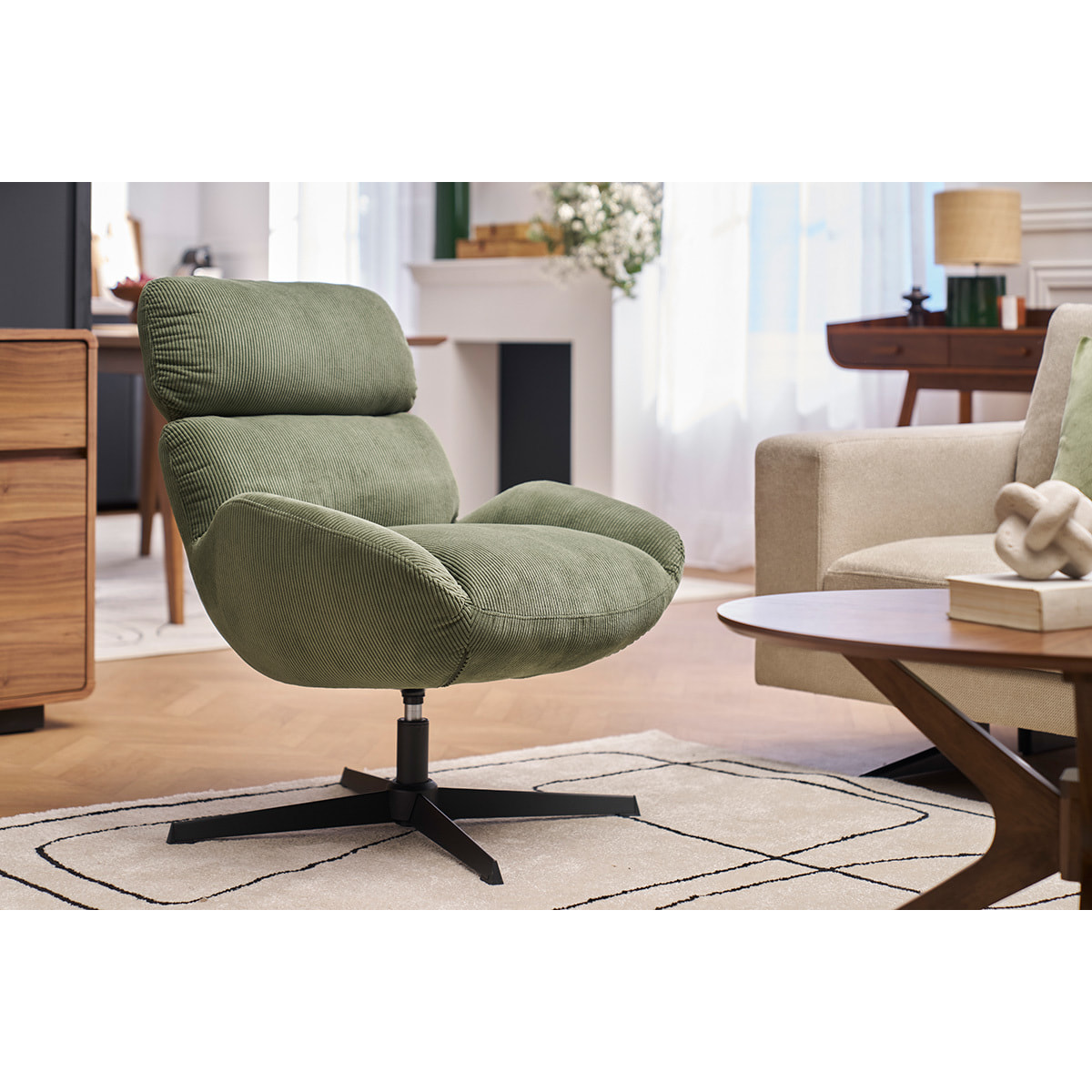 Fauteuil pivotant en tissu velours côtelé vert kaki et métal noir KLEM