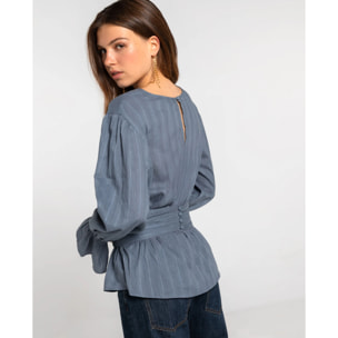 Blusa holgada con cuello barco