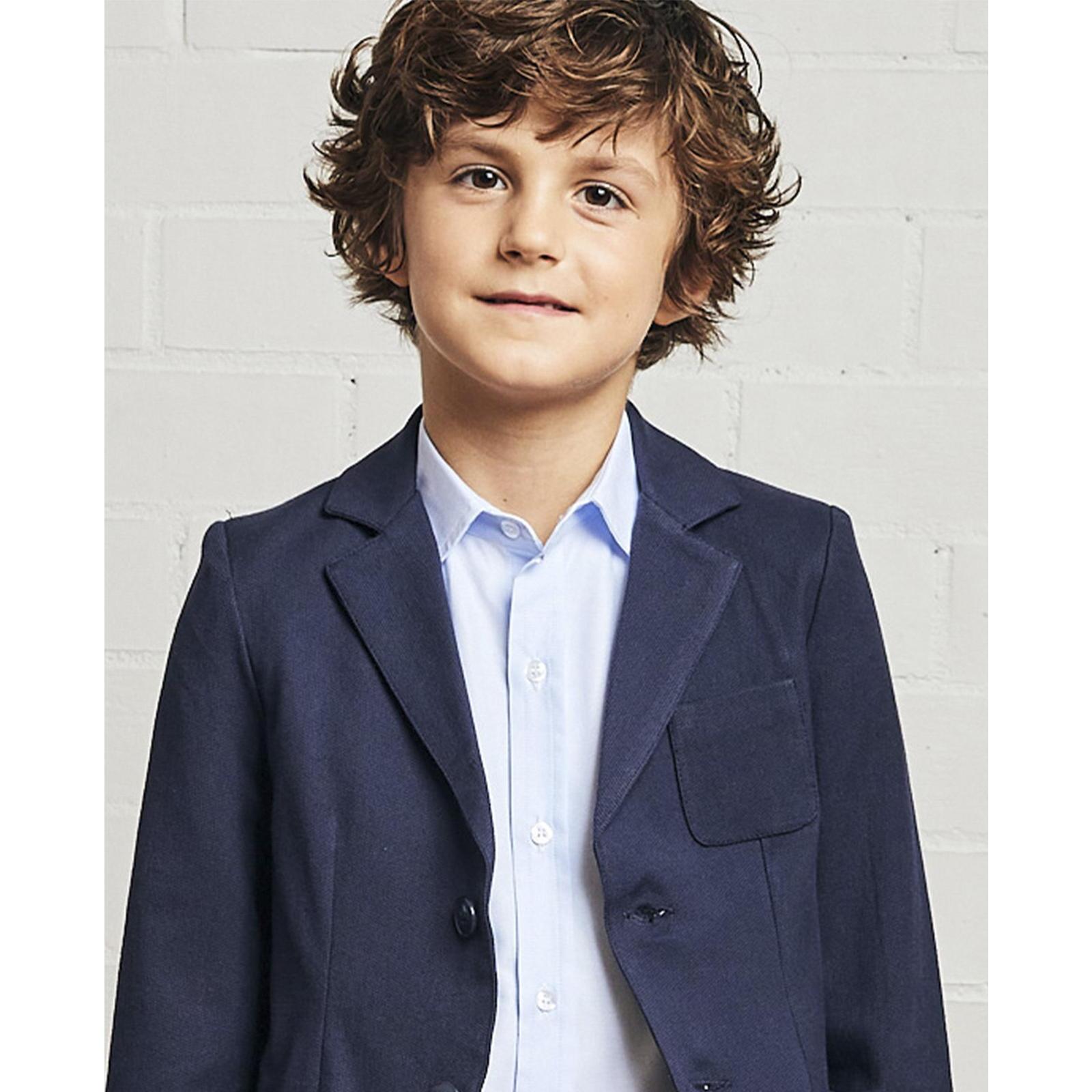 Camisa oxford azul de manga larga. Con cuello italiano.