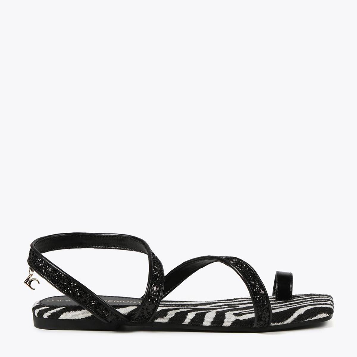 Sandali con fascette metallizzate e plantare con stampa zebrata