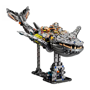 Maqueta 3D mecanizada de ballena con 1388 piezas, equipada con luces y mecanismo de manivela que permite movimiento dinámico.