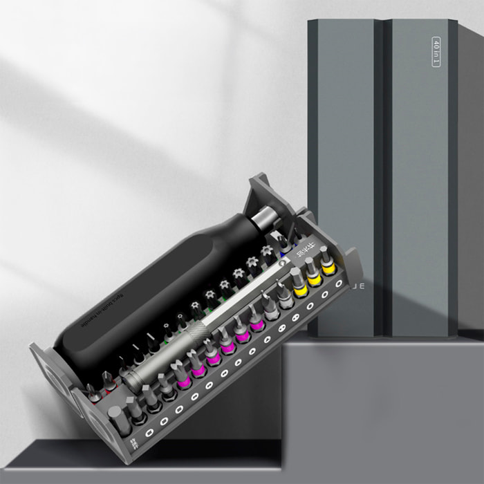 Destornillador multifunción 40 en 1 con carcasa de aluminio y compartimento para 8 puntas favoritas.