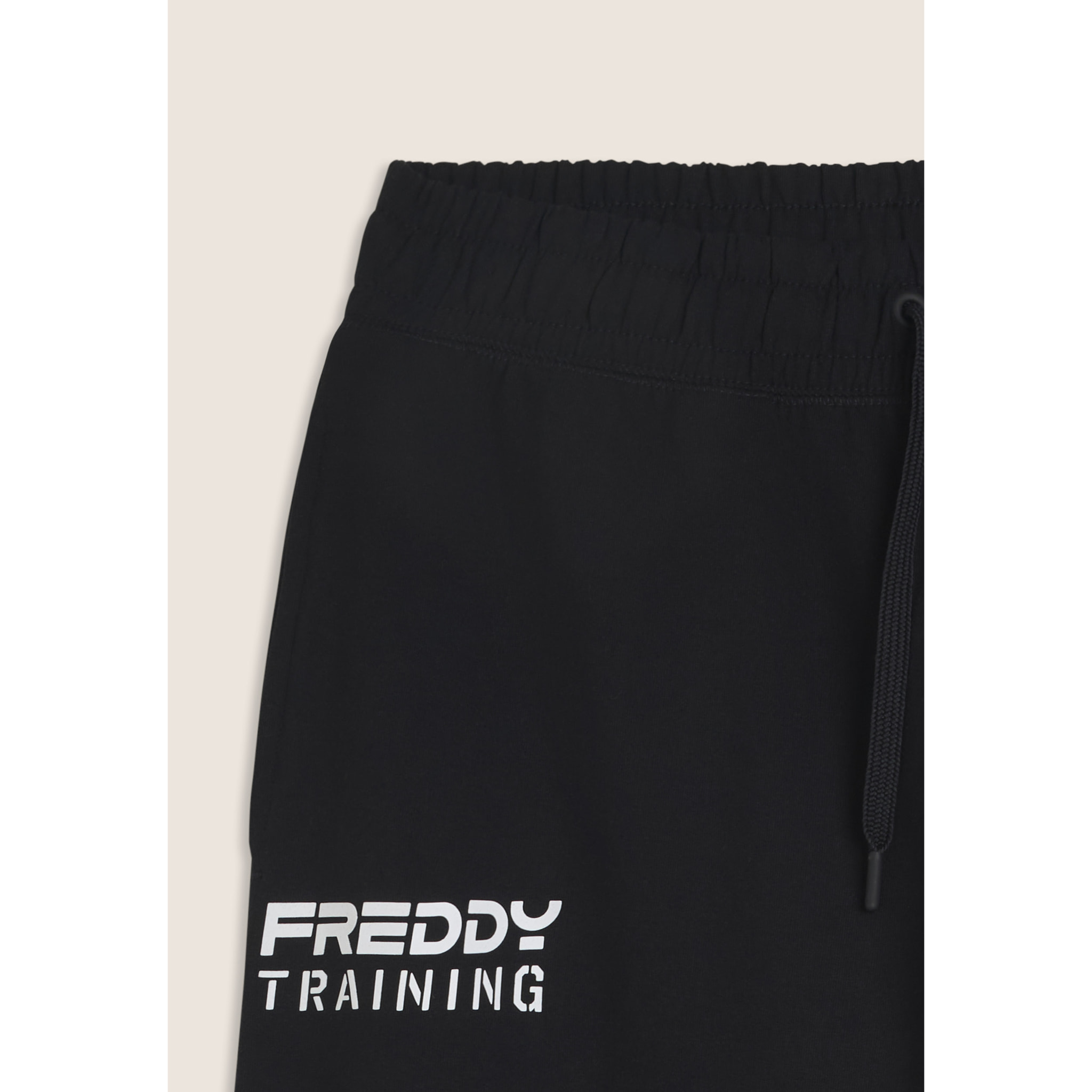 Pantaloni regular con tasca zip sulla gamba