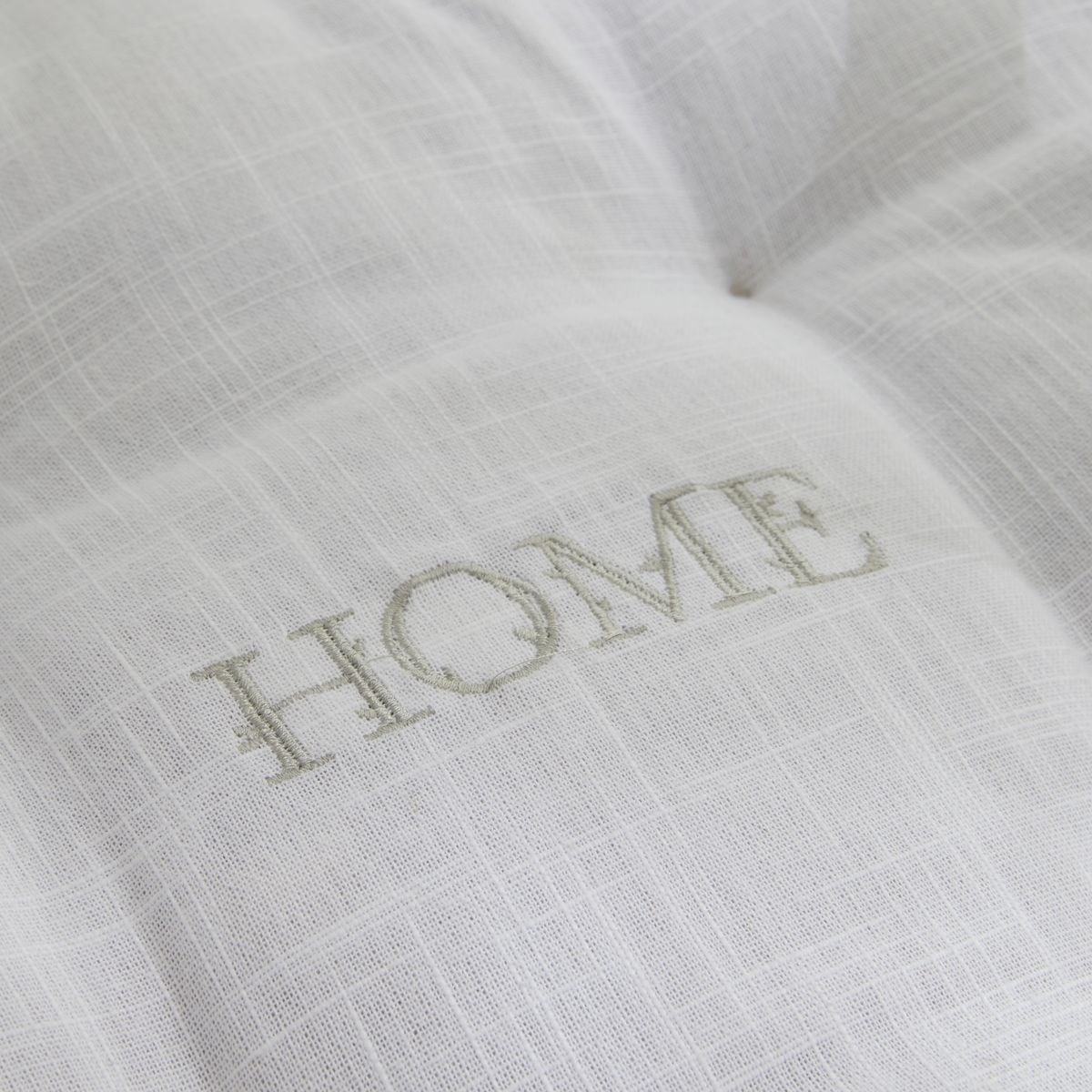 Coussin de sol avec broderies coton uni CHARME gris