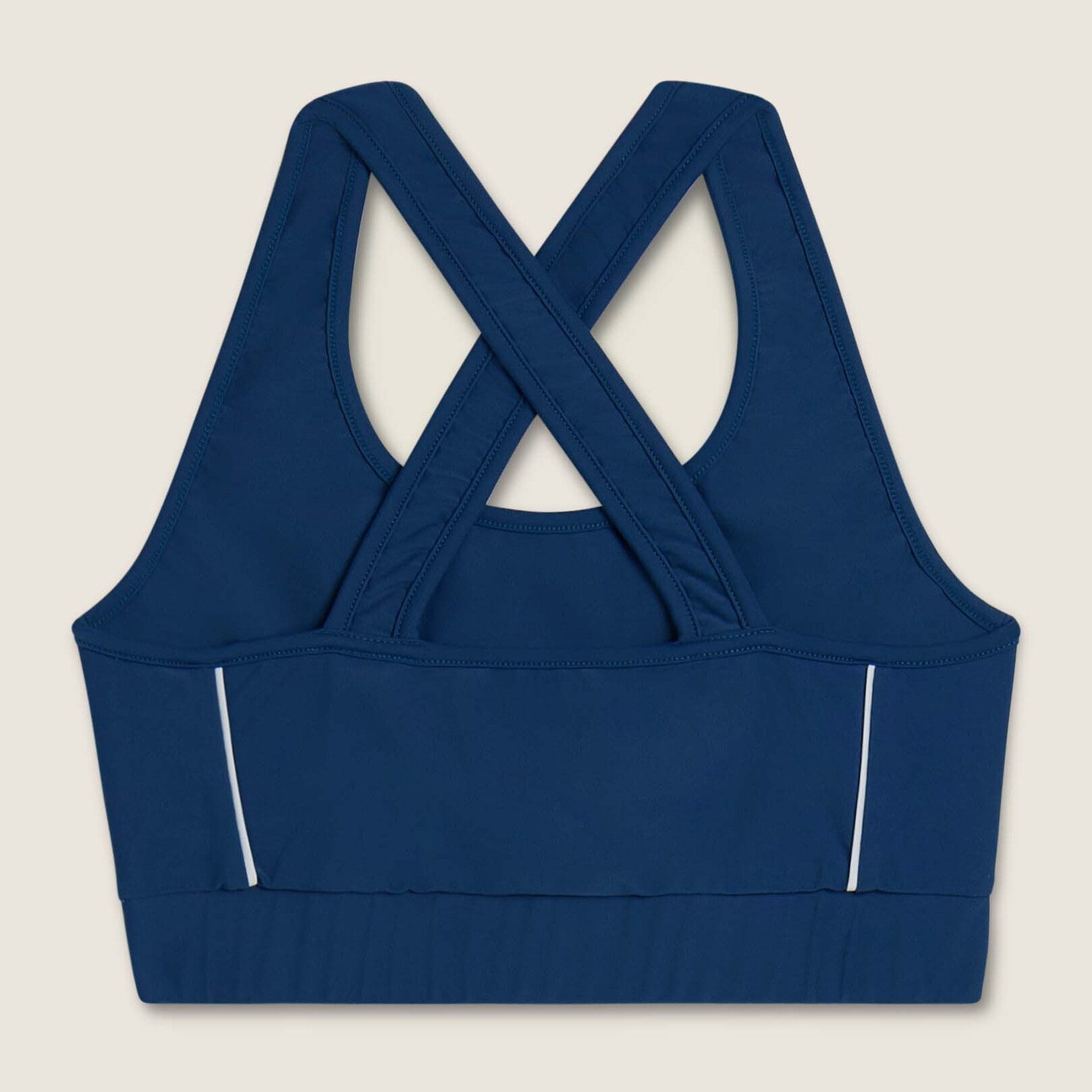 Top tecnico con spalline incrociate e profili bianchi