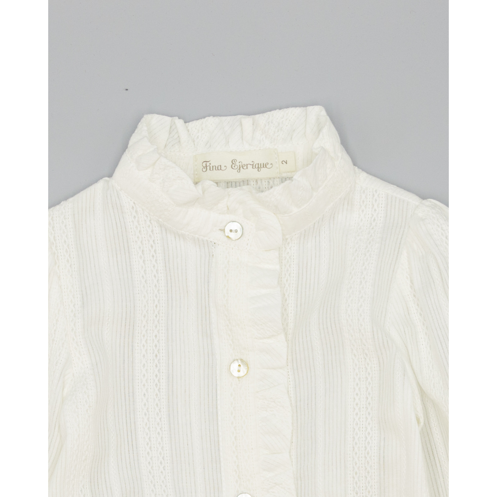 Camisa Blanca De Muselina Texturizada Con Volante