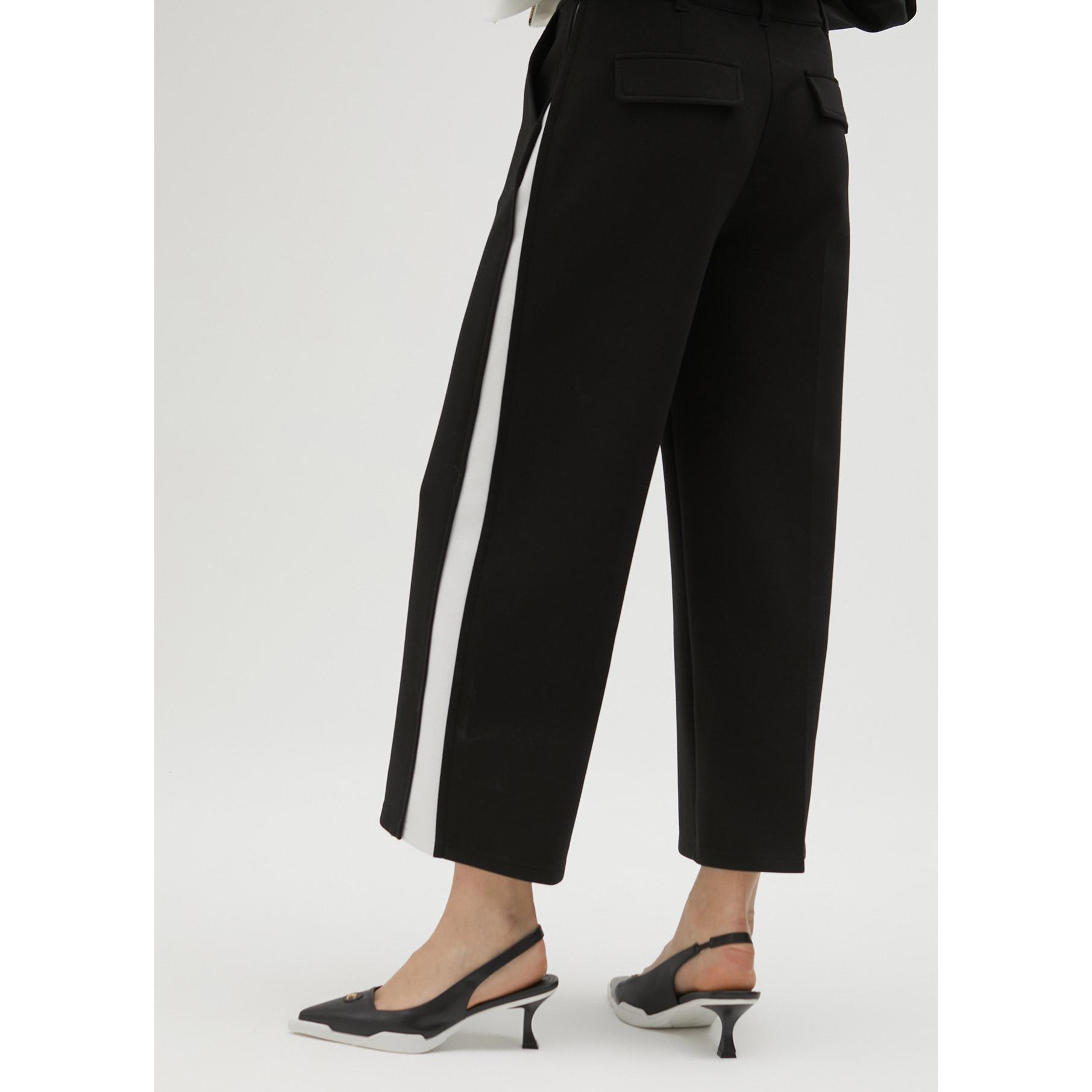 Pantaloni neri dettaglio bianco laterale
