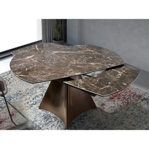 Mesa comedor extensible ovalada barril con tapa de mármol porcelánico en marrón con vetas crema en acabado brillo 135x90x75cm