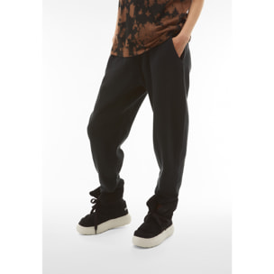 Pantaloni joggers cropped in felpa invernale tinta in capo