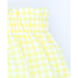 Ranita de cuadro vichy amarillo, goma en cintura y en las piernas.