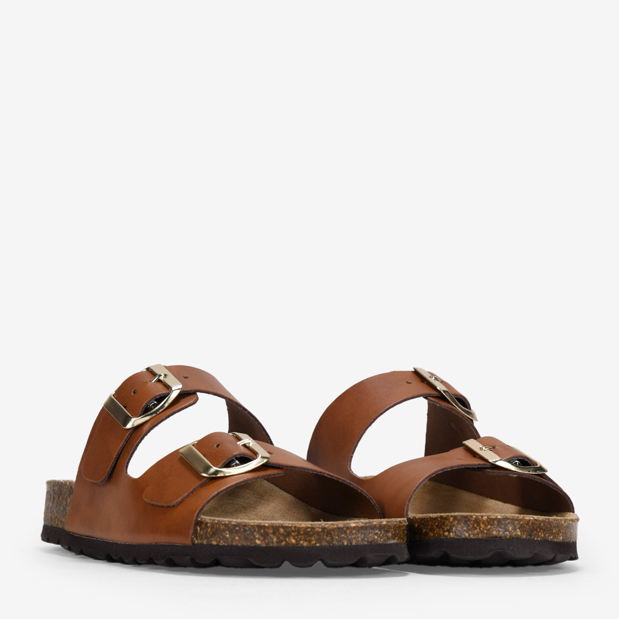 Sandalias planas de piel marrones