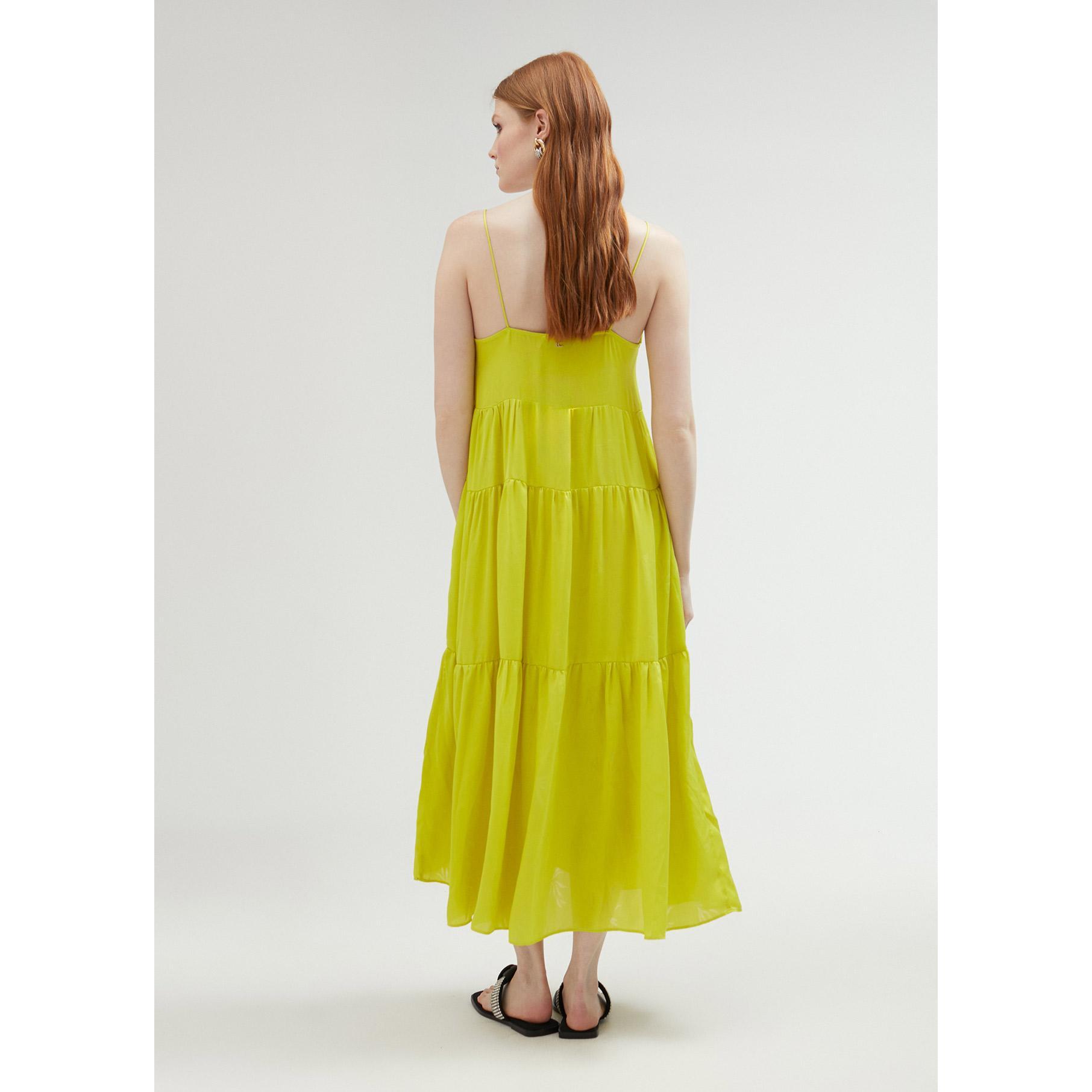 Vestito con spalline e volant