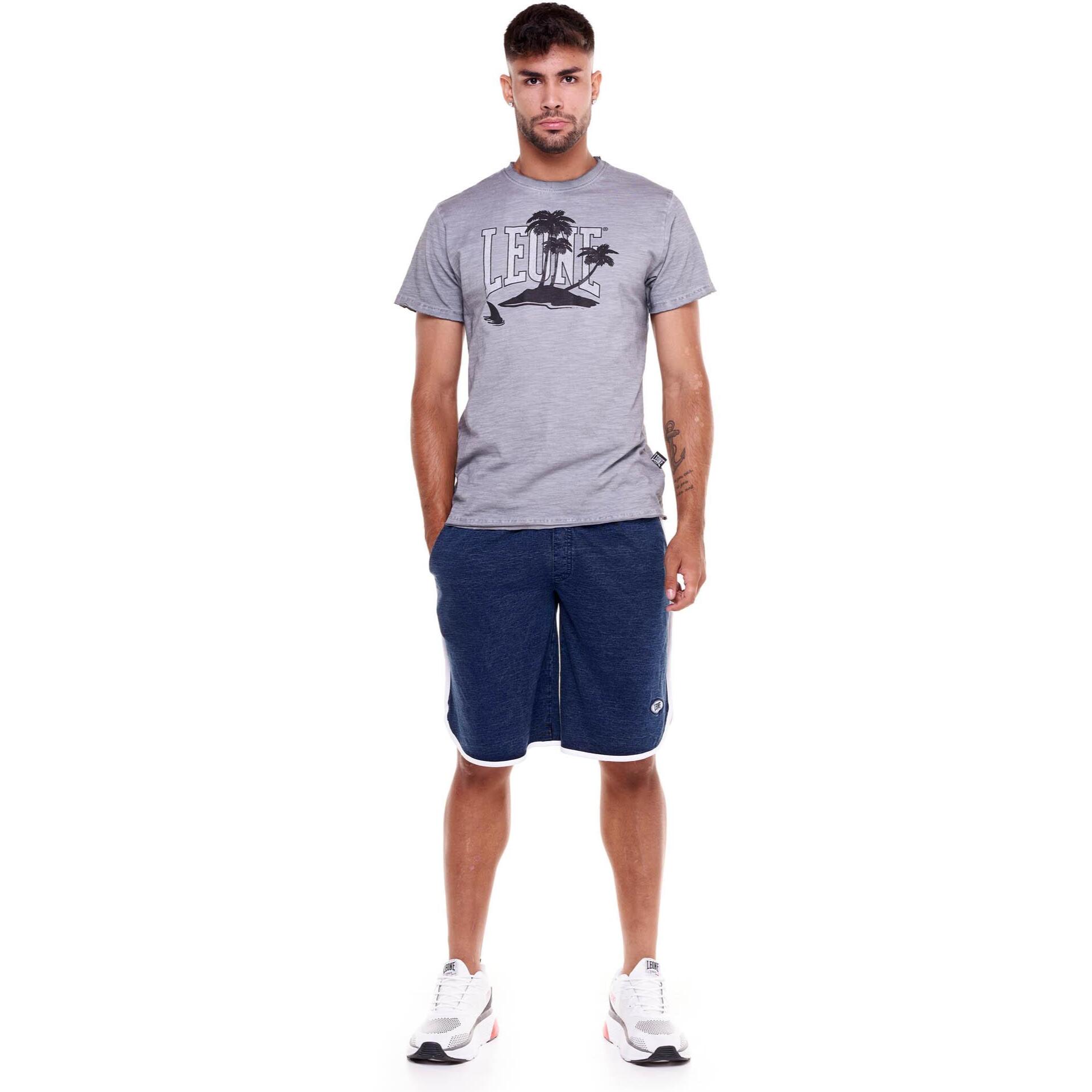 Camiseta hombre efecto desteñido palmera playa
