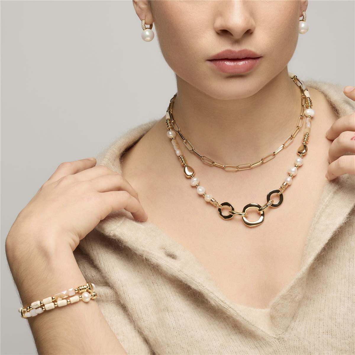 Pendientes acabado oro amarillo de 18k y Perla Blanca