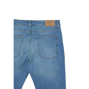 Jeans skinny con rotture