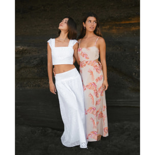 Vestido midi con bordado floral, espalda descubierta y lazada ajustable.