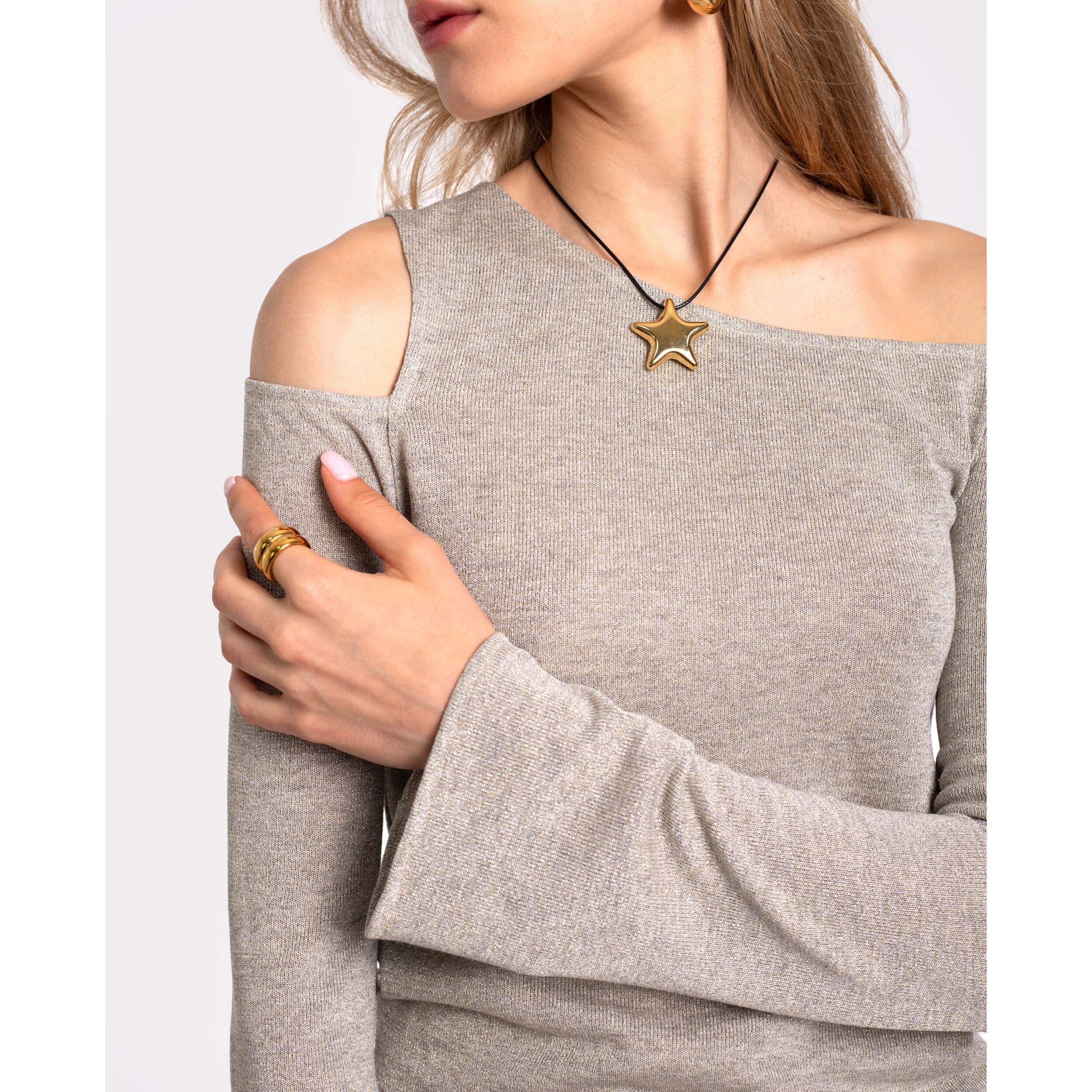 Top de mujer con manga larga y brillo