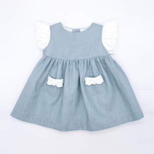 Vestido corto de lino verde, tira bordado en las sisas y los bolsillos.