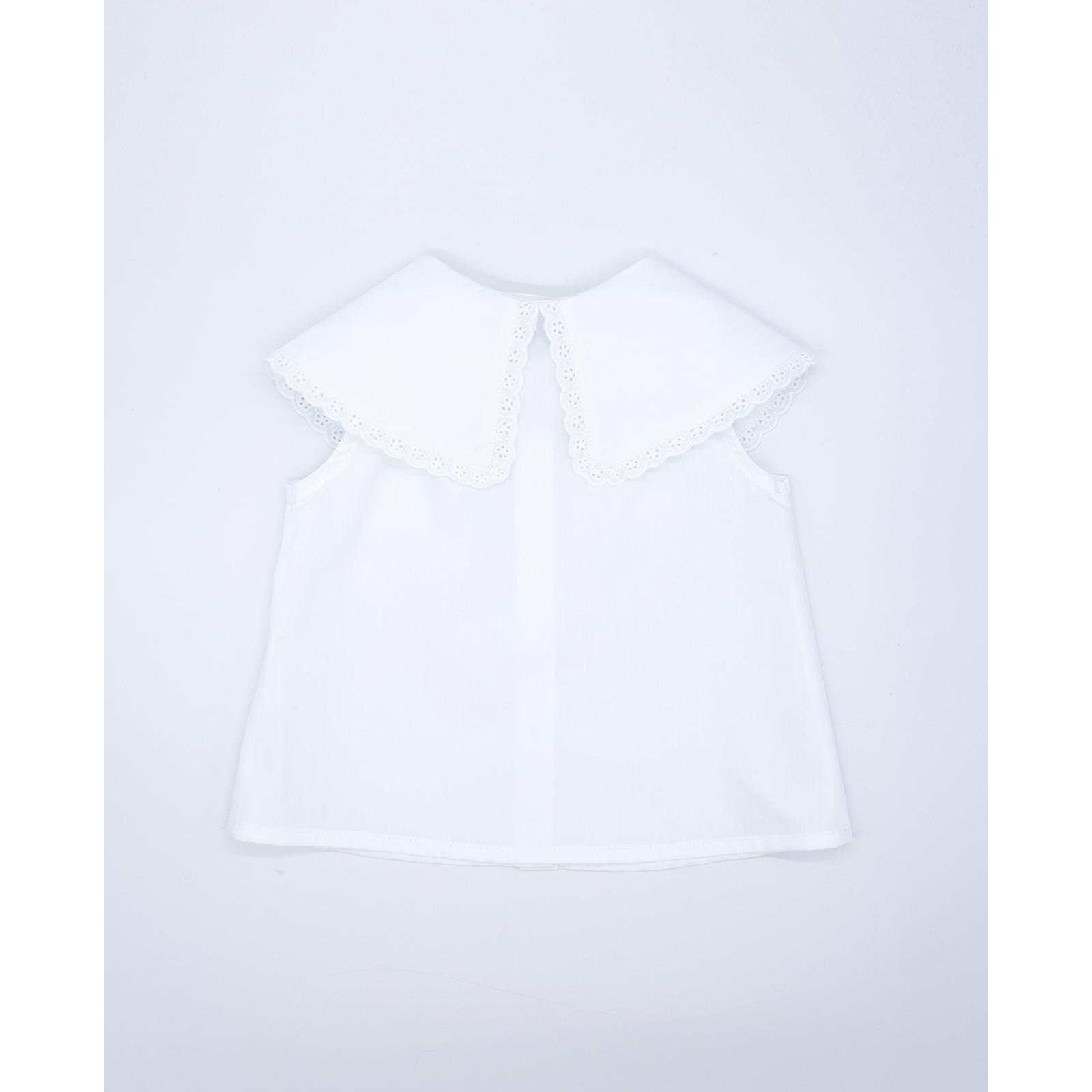 Blusa de popelin blanco con cuello.