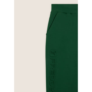 Pantaloni slim in interlock con maxi logo in rilievo