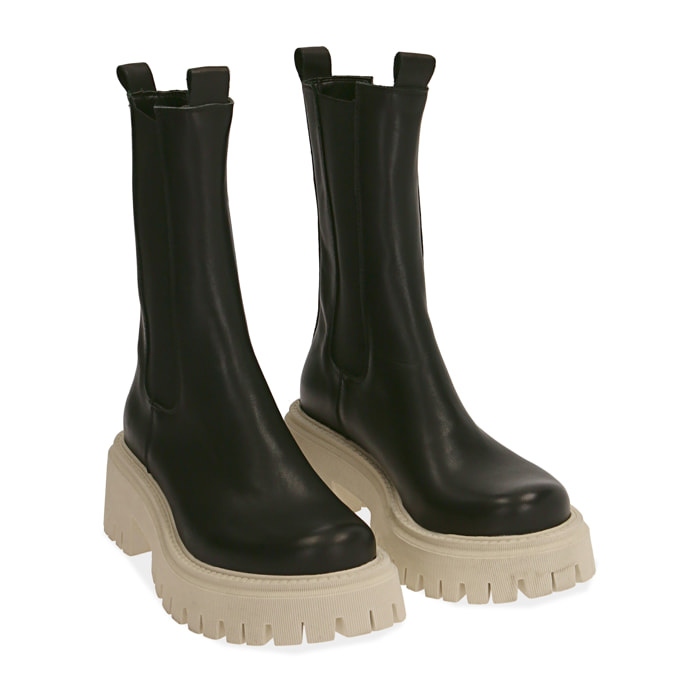 Moteras gruesas de piel negra/beige, tacón de 5 cm.