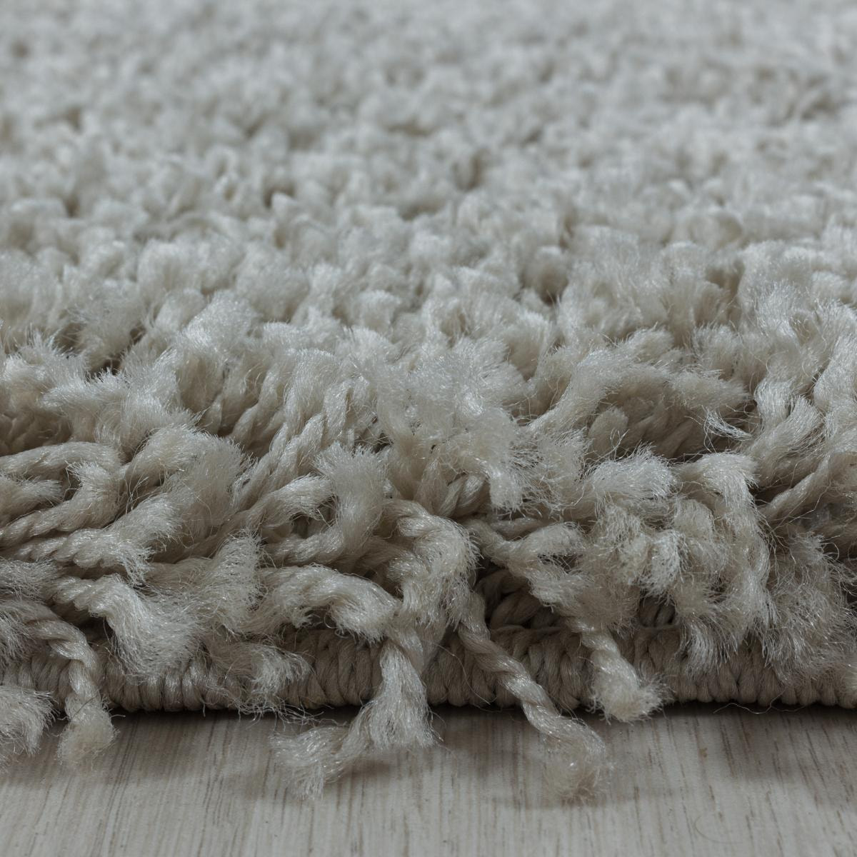 Tapis poils longs shaggy tissé motif uni RIBI