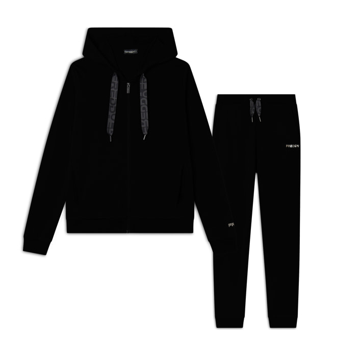 Tuta interlock zip e cappuccio con maxi coulisse logata