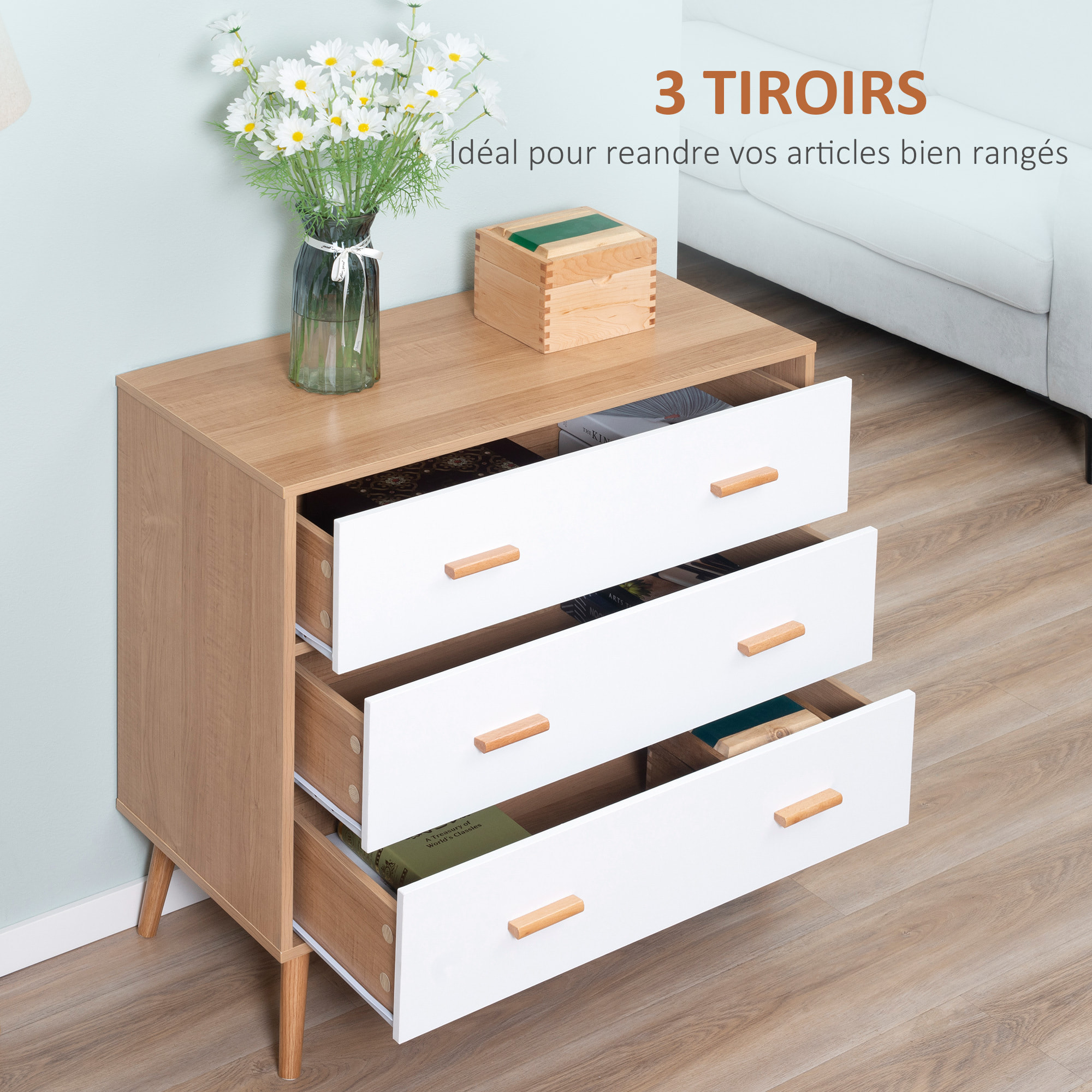 Commode design scandinave sur pieds 3 tiroirs coulissants pieds effilés inclinés panneaux particules blanc aspect bois clair