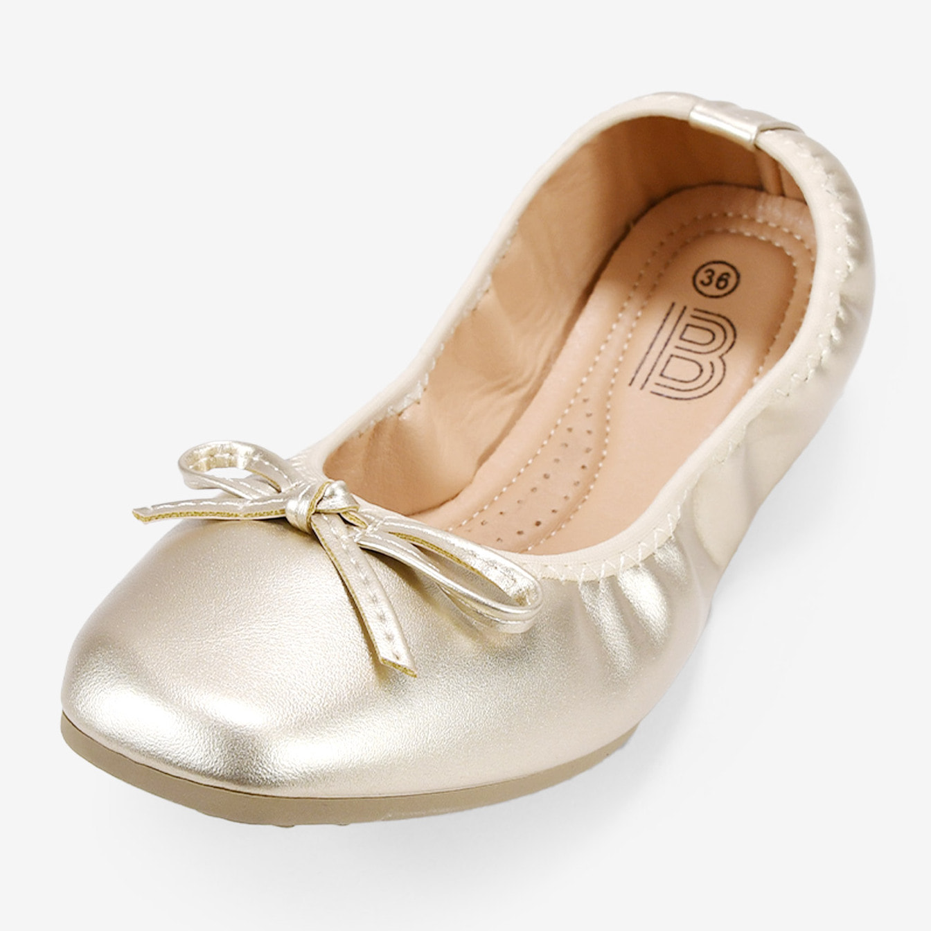 Bailarinas planas doradas con lazo