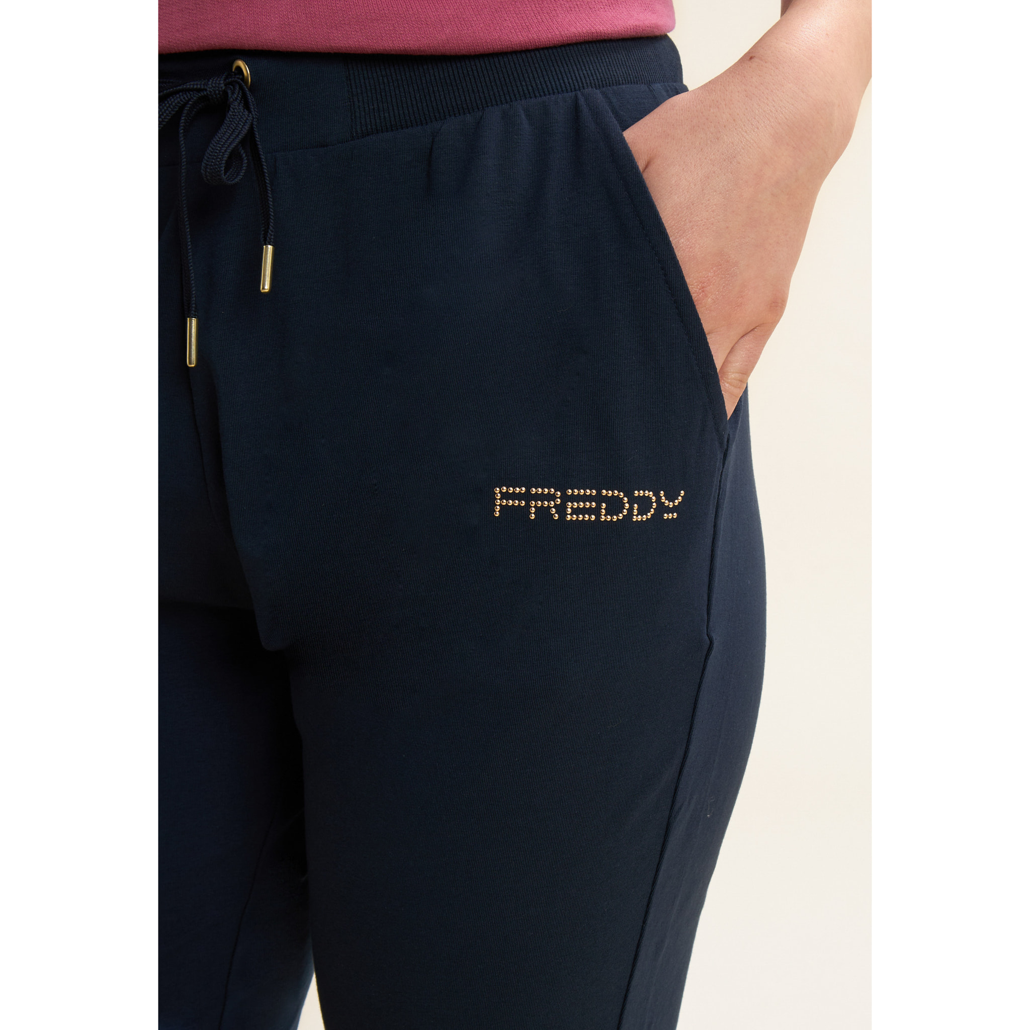 Pantaloni corsaro in jersey con logo perline