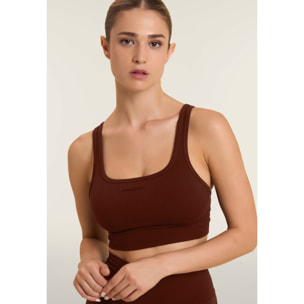 Top sportivo seamless supporto medio con inserti a costine