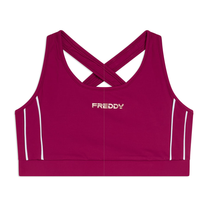 Top medio supporto in jersey tecnico con spalline incrociate