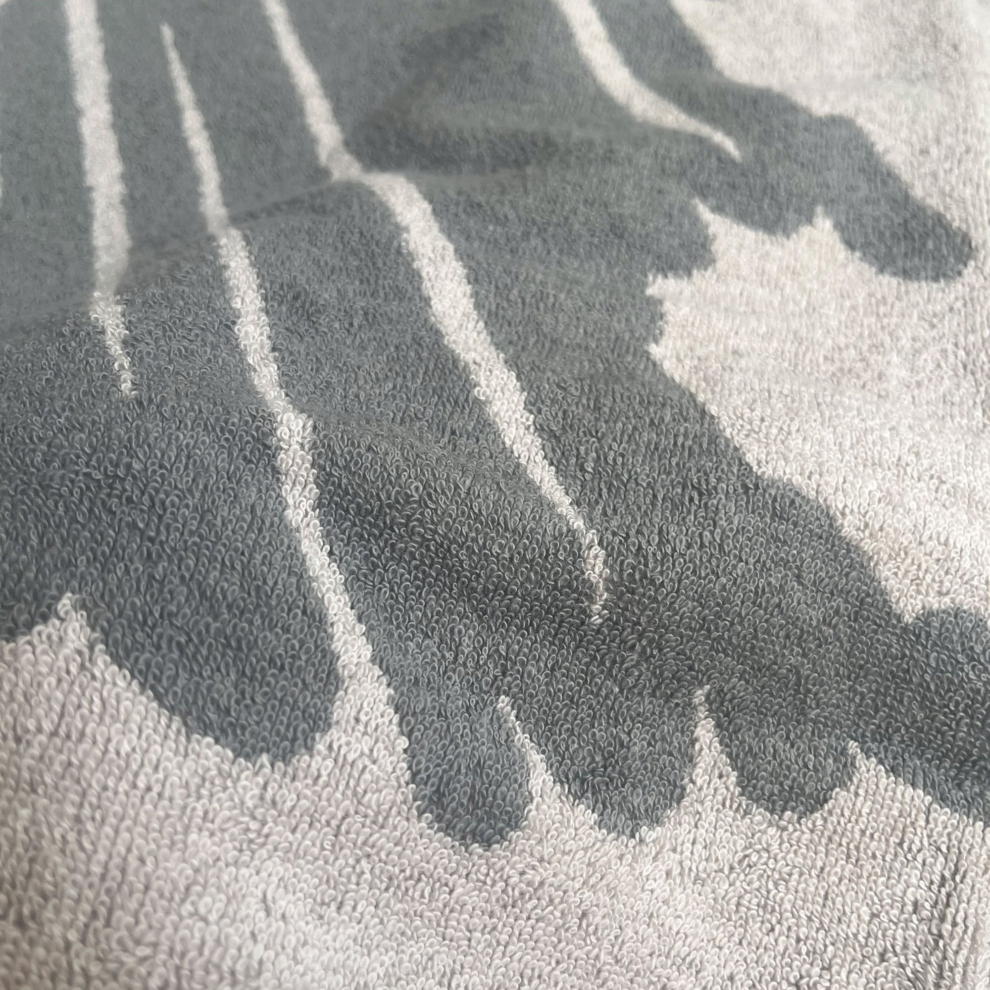 Toalla de playa 90x180cm 100% algodón 420gsm en beige con logo scalpers home