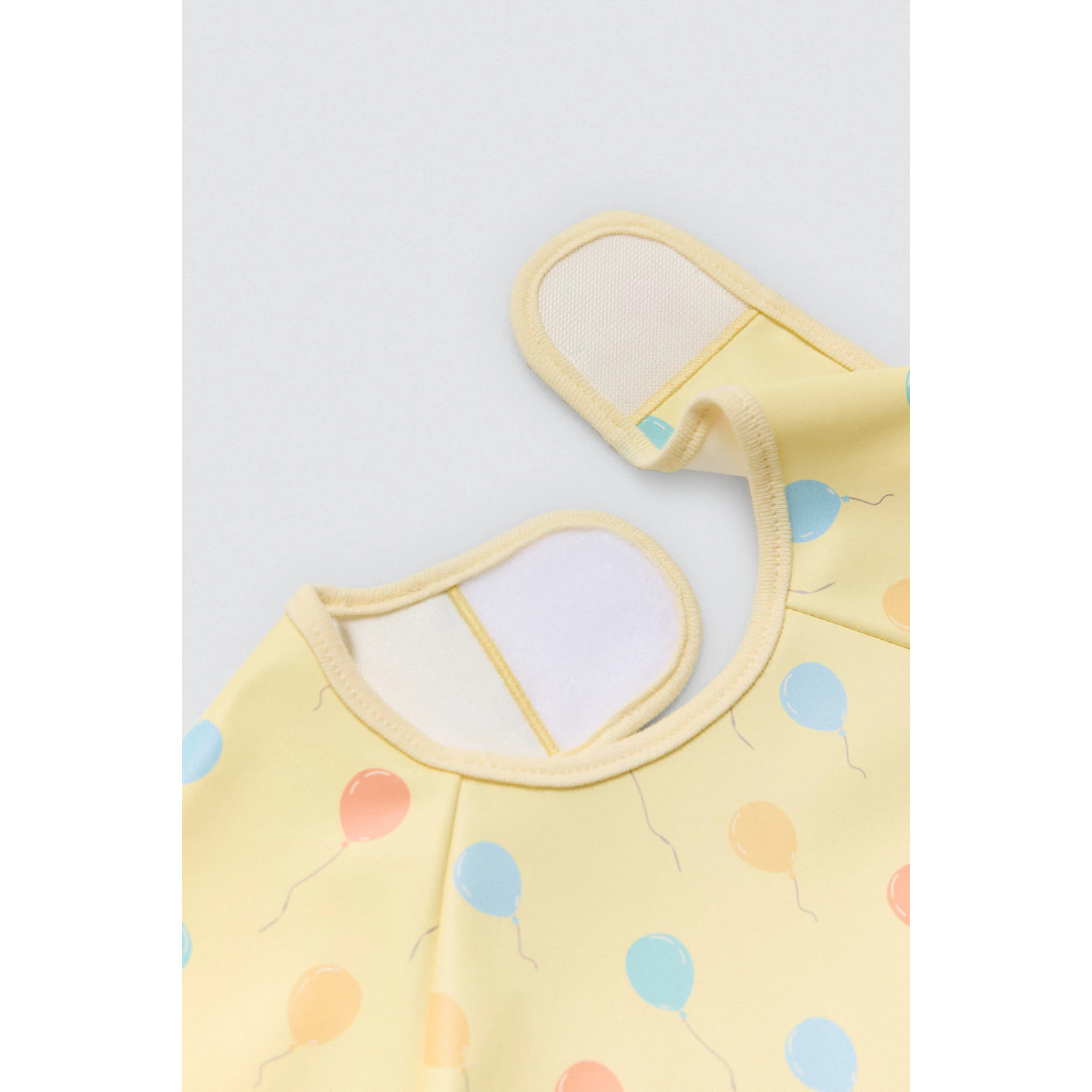 Bavaglino a maniche lunghe con stampa Hello World