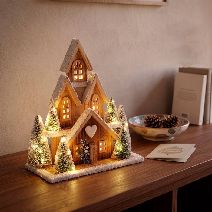 Casa navideña de madera con led blanco cálido y 6 árboles nevados, temporizador 6h 32x12x33 cm