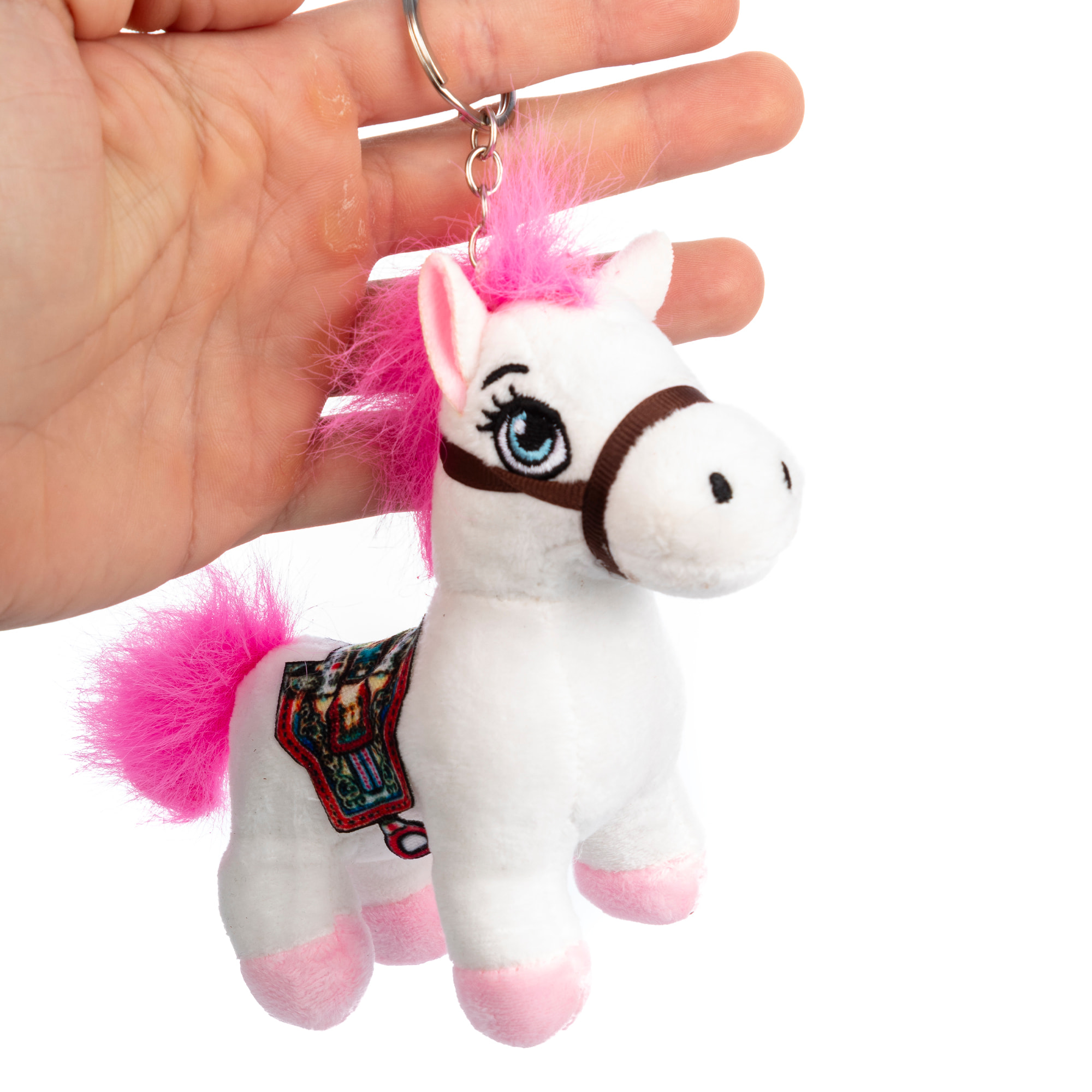 Peluche extrasuave y mullido con colgante. Diseño pony con silla de montar. 12 cm.
